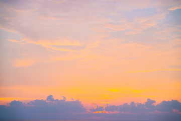 Colorful sunset sky with cloud above sea shore