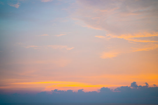 Colorful sunset sky with cloud above sea shore © themorningglory