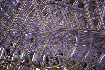 Bicycle’s wheel illuminated by a purple  light