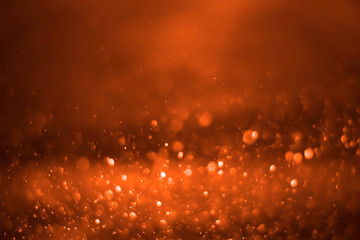 Red glitter vintage lights background. White bokeh on red background.