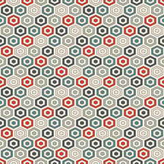 Honeycomb background. Retro colors repeated hexagon tiles wallpaper. Seamless pattern with classic geometric ornament.