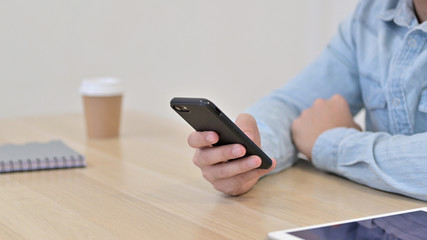 Hand of Man using Smartphone, Close up