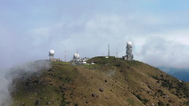 Aerial view of Mt. Dai Mo Shan and weather radar site in fog