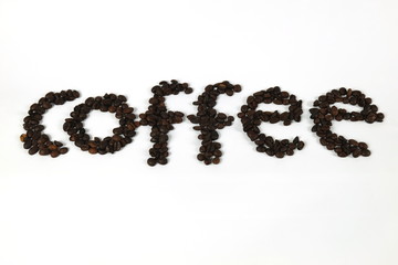 The coffee beans are arranged in alphabetical order and the coffee powder is on a white background.
