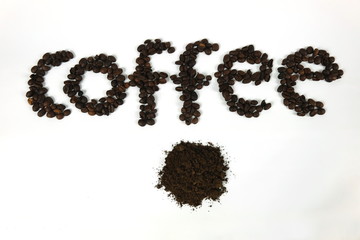 The coffee beans are arranged in alphabetical order and the coffee powder is on a white background.