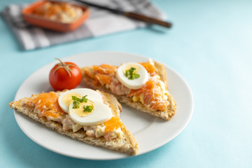 Toasted whole grain bread with a fresh smoked salmon spread made with a light yogurt and spices.