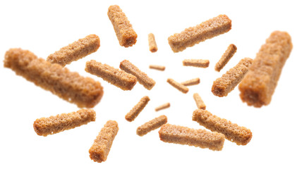 Bread croutons levitate on a white background