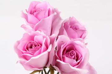 Pink colorful textile rose closeup