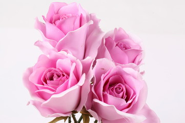 Fototapeta premium Pink colorful textile rose closeup