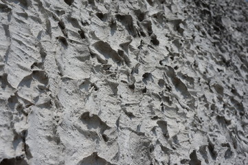 Aged street and concrete wall background  texture closeup abstract texture background