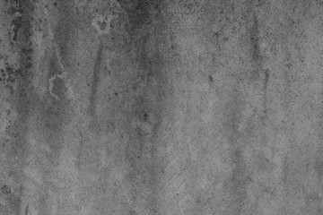 White concrete wall with black stains as background