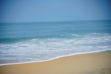 Sea waves coming to a beach