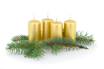 Advent candles with coniferous twigs. Isolated on white background with natural shadow. Composition...