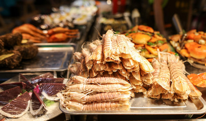 Fototapeta premium Seafood in a shop window in a cafe.