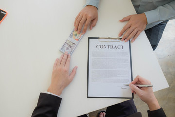 Frauds make money for exchange of business contracts. Real estate or illegal contract