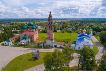 Fototapeta premium View of the ancient temples of Velikoye village on a sunny July day (shooting from a quadrocopter). Yaroslavl region, Russia