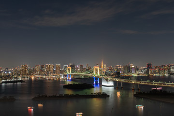 view of the river in Odaiba Tokyo. Rainbow Bridge at Night.