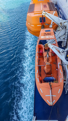 Lifeboat attached to the side of a passenger ship