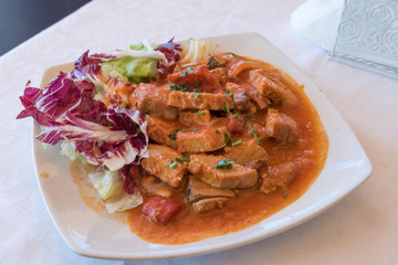 Stew with tomato sauce and onion