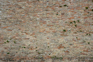 Ancient red brick wall