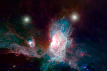 A beautiful nebula of different colors, with stars and galaxies. Elements of this image were...