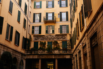Fototapeta premium Yard of historical architecture building with balconies in touristic city center in european capital