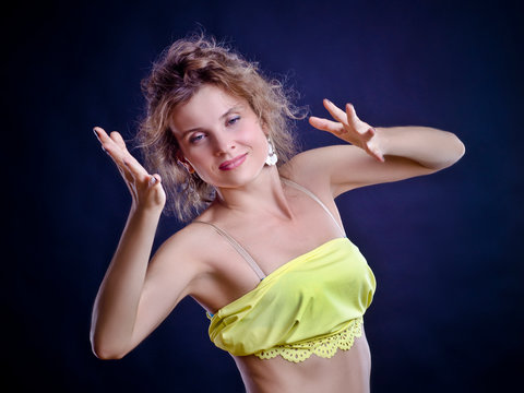 Beautiful woman on a dark background.