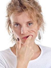 Portrait of a beautiful woman on a light background.
