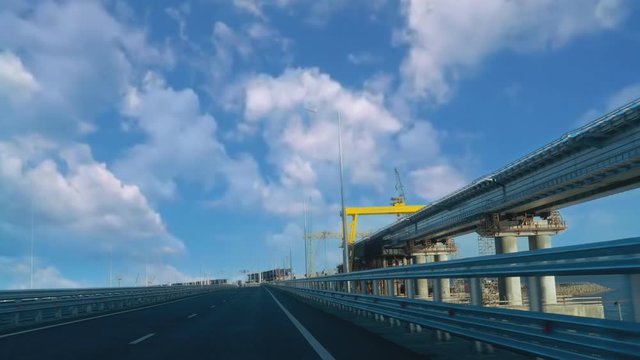 cinemagraph of a landscape with clouds over the Crimean bridge, Russia.