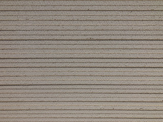 Piled sheets of drywall. Plasterboard sheets. Gypsum cardboard