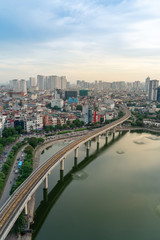 Hanoi cityscape during sunset period. Skyline view of Hanoi at Hoang Cau lake