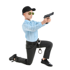 Cute little police officer on white background