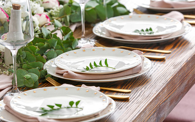 Beautiful table setting for wedding celebration in restaurant