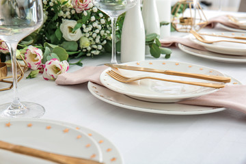 Beautiful table setting for wedding celebration in restaurant