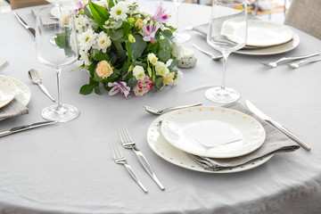 Beautiful table setting for wedding celebration in restaurant