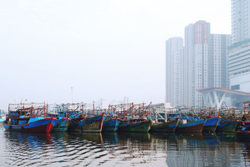 Fototapeta na wymiar many boats in the harbour in jakarta harbour