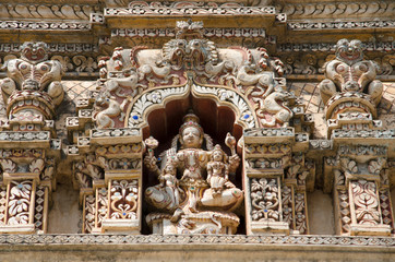 Colourful carved idols on the inner wall of Jain Math, Shravanabelagola, Karnataka, India