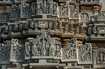 Carved idols on the outer wall of Veera Narayana temple, it was built during the rule of the...