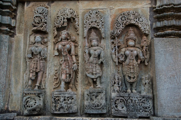Carved idols on the outer wall of the Chennakeshava Temple complex, is a 12th-century Hindu temple...