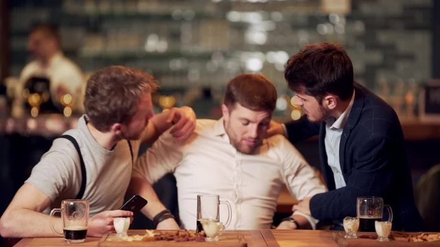 Friends do not allow drunk driving, and call a sober taxi driver