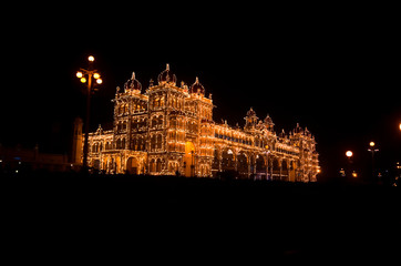 One of the entrance gate of the Mysore Palace at night, is a historical palace and a royal residence, Mysore, Karnataka, India