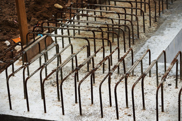 Metal details on construction site foundation corner
