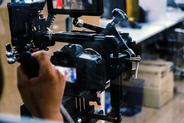 Film industry. Filming with professional camera background