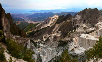 Fototapeta na wymiar Aerial view of marble quarry Canalgrande Alto with Ligurian sea coastline. Carrara. Apuan Alps. Tuscany. Italy.
