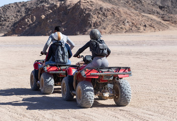 Tours of the desert on Quad bikes. ATV safaris. A vehicle for racing in the Sahara.