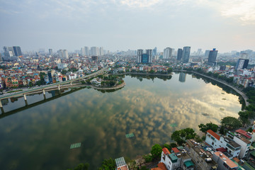Aerial skyline view of Hanoi city, Vietnam. Hanoi cityscape by sunset period at Hoang Cau lake, Dong Da district