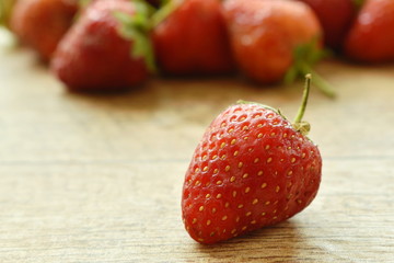 fresh strawberry arranging on wooden board