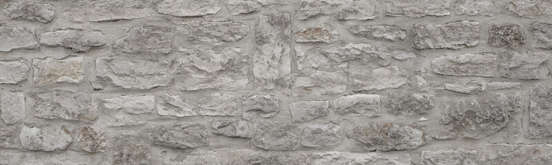 Banner: Textur Alte graue Steinmauer. unregelmäßige Steine
