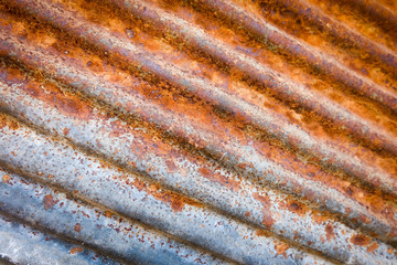 rusty corrugated metal background. Close up surface of old​ zinc and​ rusty​ texture​ background.​ metal​ sheet​ with​ rusty​ texture.