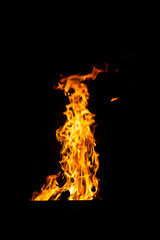 Danger fire on a dark background. Background from fire. Fire pattern can be used in design